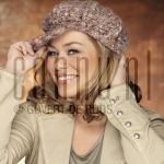 25-01-2005 Antje Monteiro at studio in Amsterdam, January 25, 2005.

[keywords]Posed, Headshot, Smiling, Cap[/keywords]